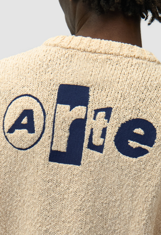 BACK GRAPHIC KNIT TEE CREAM